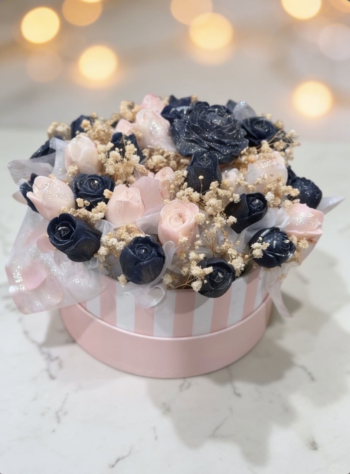 Navy and blush rose candle box, striped lid, marble setting